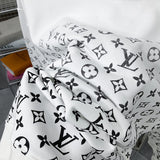 Front view of Louis Vuitton luxury clothing with everyday silhouette