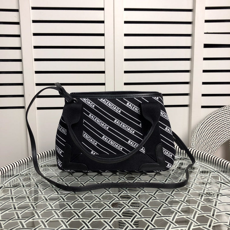 Front view of chic polished women's handbag – women's luxury handbag