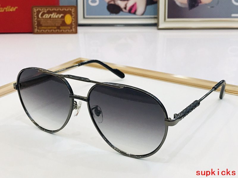 Angled view of Cartier unisex sunglasses