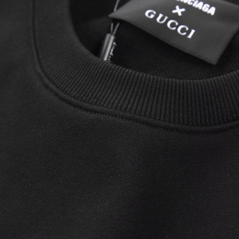 Close-up detail shot of Gucci luxury clothing with signature branding