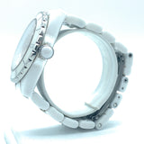 Close-up detail view of Chanel unisex white watch