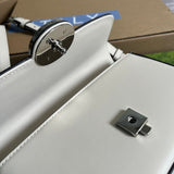 Styled lifestyle shot of structured everyday-luxe women's handbag – women's designer-style accessory