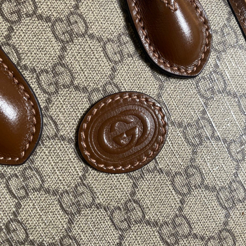 Back view of polished signature women's handbag – women's premium purse