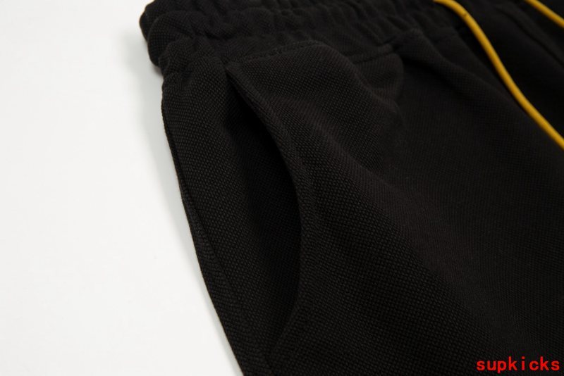 Front view of Rhude luxury clothing with contemporary cut