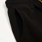 Front view of Rhude luxury clothing with contemporary cut