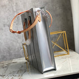 Styled lifestyle shot of modern statement women's handbag – women's designer-style accessory