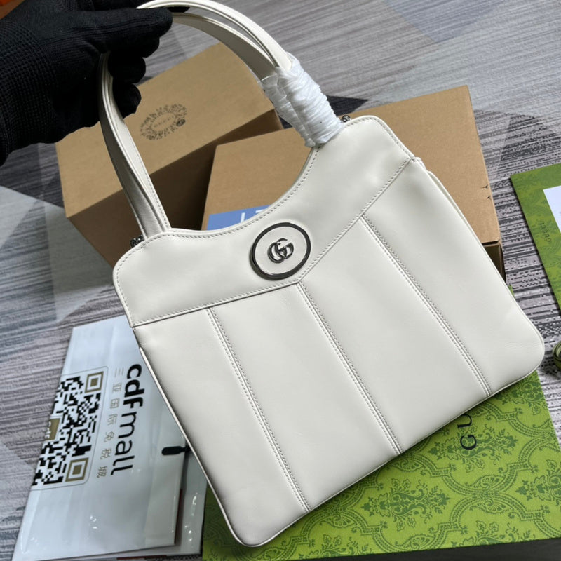 Styled lifestyle shot of everyday-luxe structured women's handbag – women's premium purse