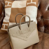 Side view of minimalist structured handbag