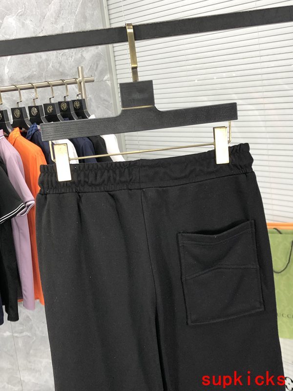 Back view of Rhude luxury clothing with logo-detail design