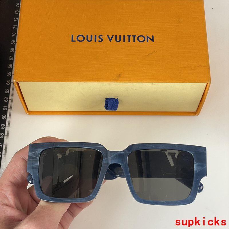 Angled view of Louis Vuitton unisex sunglasses
