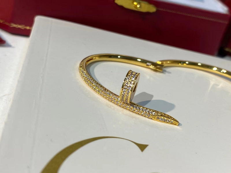 Side view of Cartier unisex jewelry piece