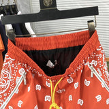 Back view of Rhude luxury clothing with label-forward styling
