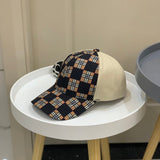 Side view of Burberry unisex cap