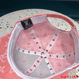 Close-up detail view of Louis Vuitton unisex cap