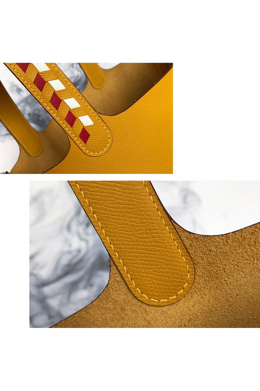 Side view of timeless structured handbag