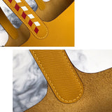 Side view of timeless structured handbag