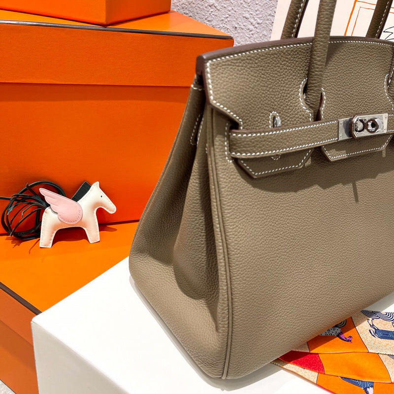 Side view of modernist structured handbag