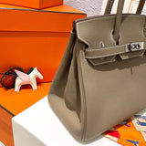 Side view of modernist structured handbag