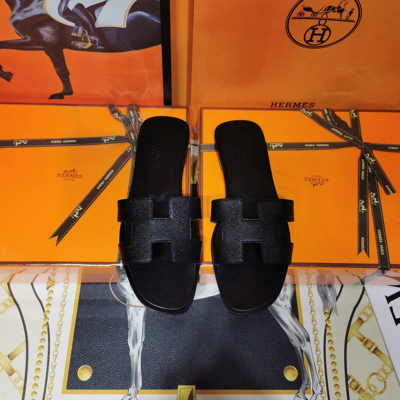 Hermes sandals Style 032 - angled studio shot