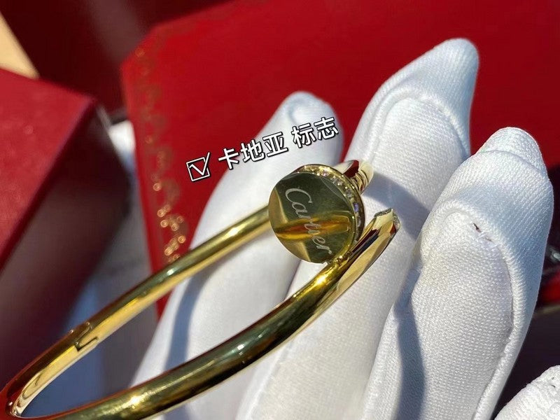 Side view of Cartier unisex jewelry piece