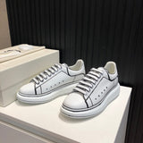 Alexander McQueen soft grey luxury sneakers view 6 chunky sole construction