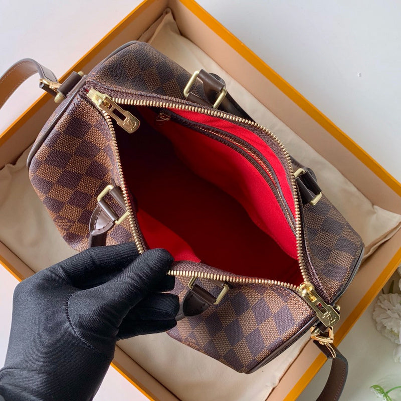 Handle and strap detail of polished signature women's handbag – women's luxury handbag