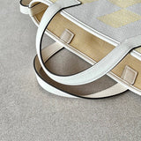 Side view of elegant structured handbag