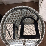 Front view of refined chic women's handbag – women's luxury handbag