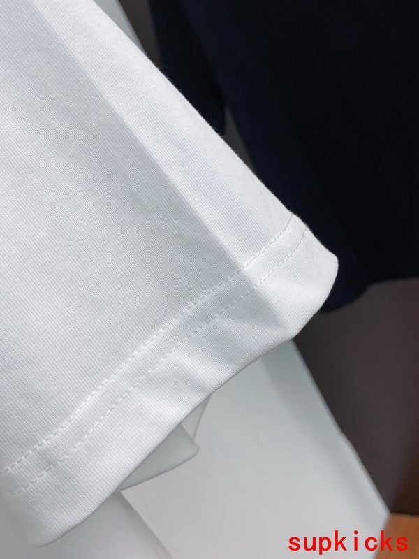 Flat lay presentation of Moncler luxury clothing with contemporary cut