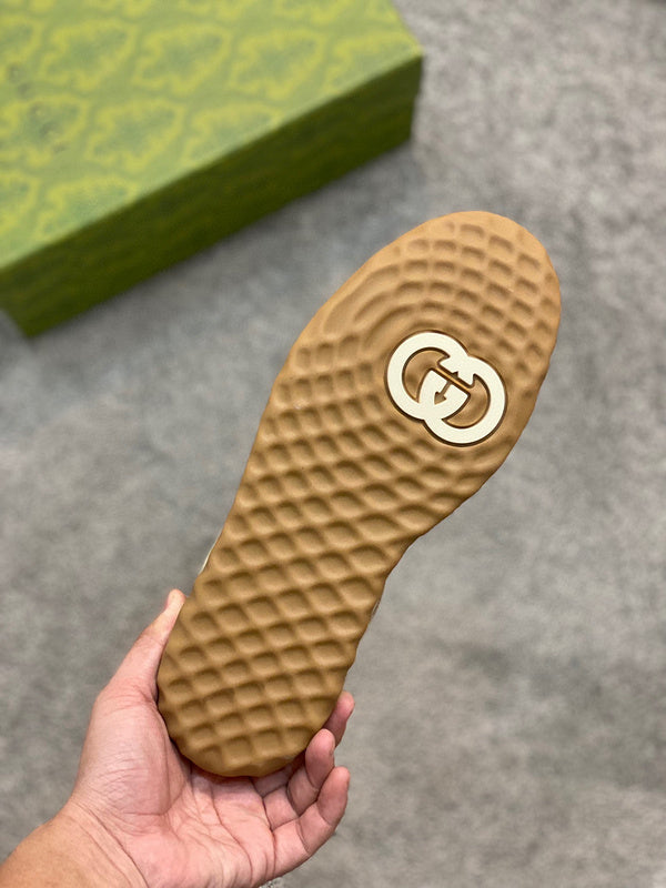 Side profile of Gucci muted earth tones sneakers everyday casual design