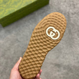 Side profile of Gucci muted earth tones sneakers everyday casual design