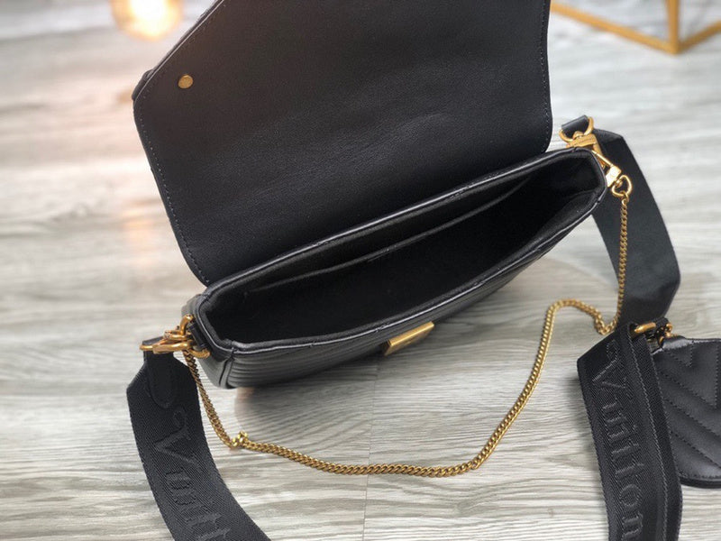 Side profile of premium chic women's handbag – women's luxury accessory