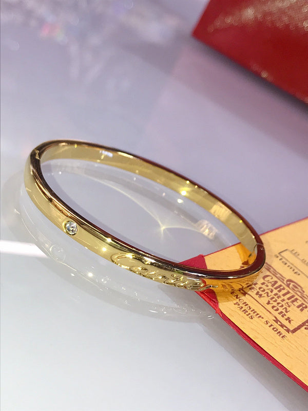 Front view of Cartier unisex jewelry piece