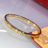 Front view of Cartier unisex jewelry piece