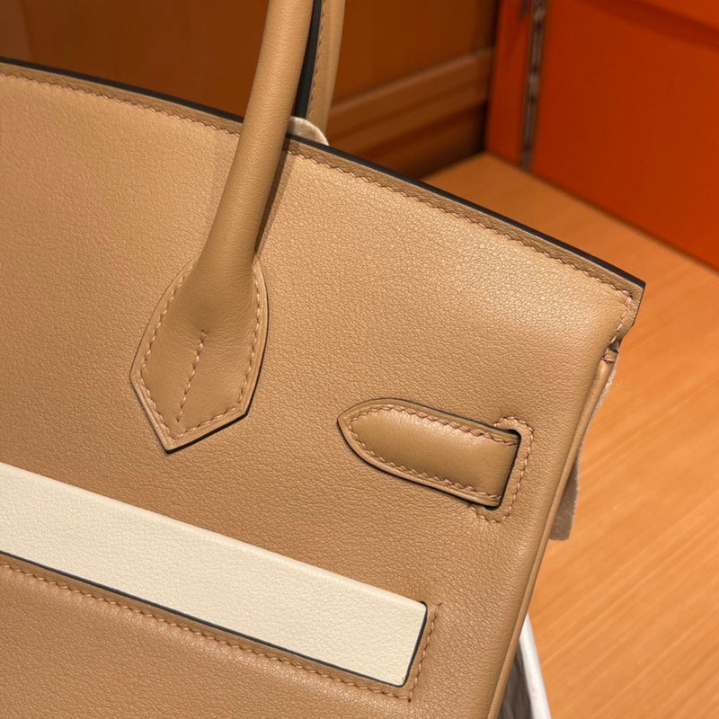 Side view of timeless structured handbag