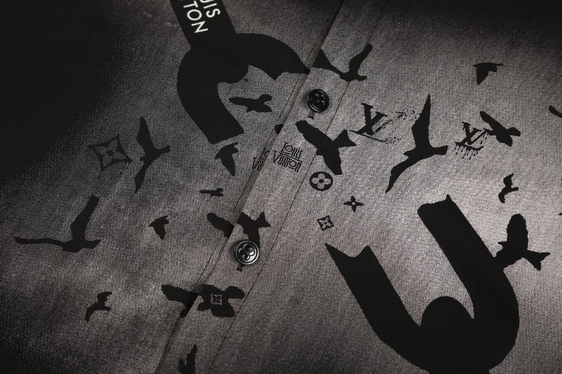 Flat lay presentation of Louis Vuitton luxury clothing with logo-detail design