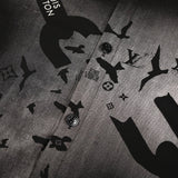 Flat lay presentation of Louis Vuitton luxury clothing with logo-detail design