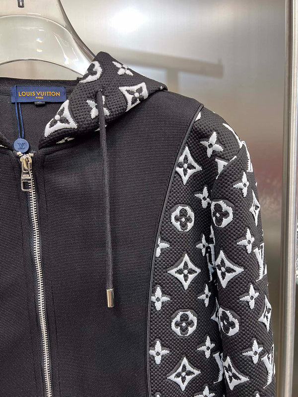 Full styled look of Louis Vuitton luxury clothing with label-forward styling
