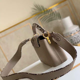 Close-up detail of modern refined women's handbag – women's designer-style accessory