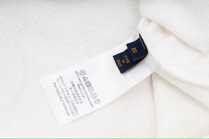 Close-up detail shot of Louis Vuitton luxury clothing with contemporary cut