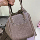Side view of statement structured handbag