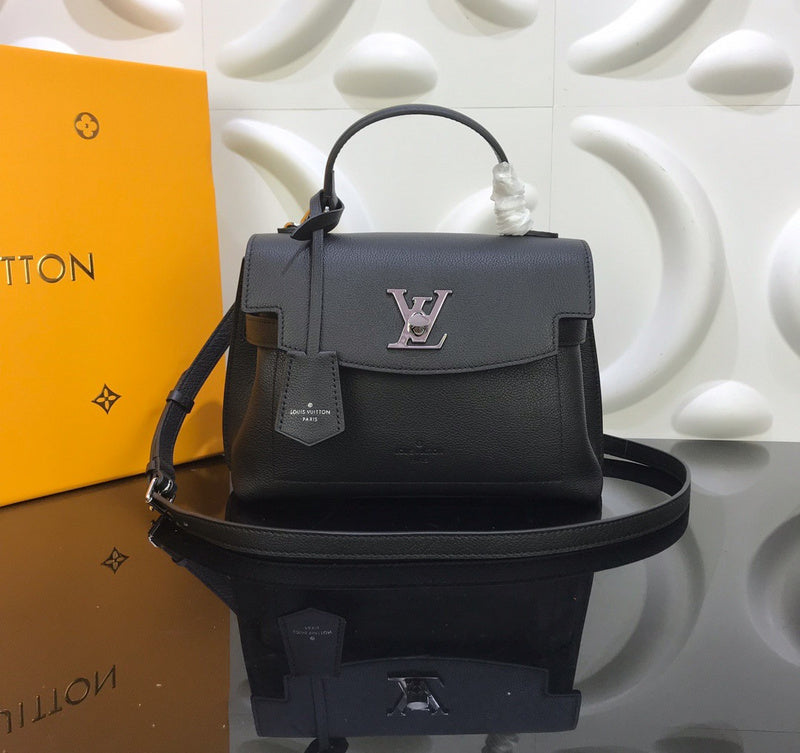 Front view of polished signature women's handbag – women's designer-style accessory