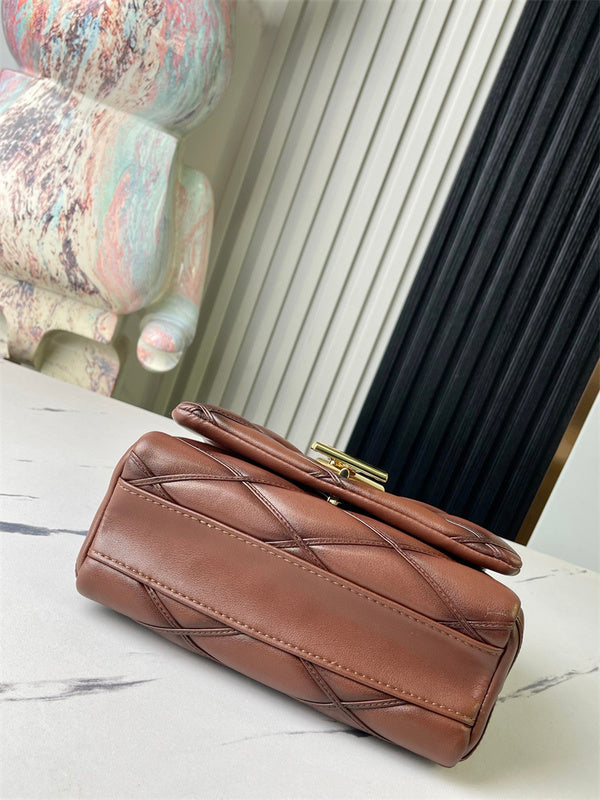  structured shoulder bag styled with outfit