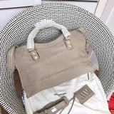 Close-up detail of everyday-luxe elevated women's handbag – women's luxury accessory