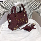 Side profile of everyday-luxe sleek women's handbag – women's statement bag