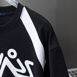 Full styled look of Louis Vuitton cotton t-shirt with signature branding