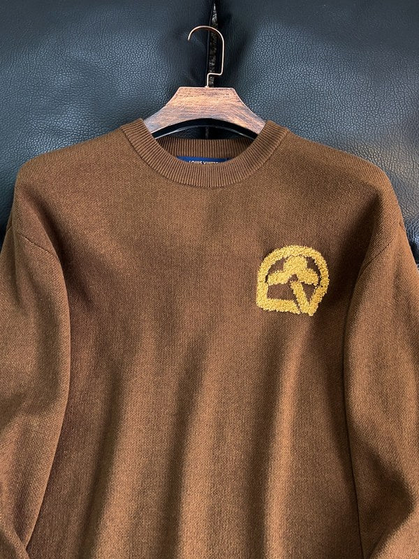 Full styled look of Louis Vuitton luxury clothing with monogram-inspired silhouette