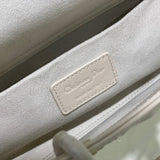 Styled lifestyle shot of polished modern women's handbag – women's premium purse