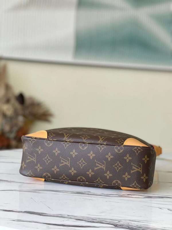 Styled lifestyle shot of refined statement women's handbag – women's luxury accessory