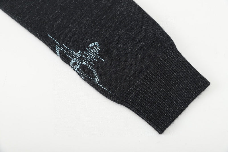 Close-up detail shot of Louis Vuitton luxury clothing with relaxed-fit cut